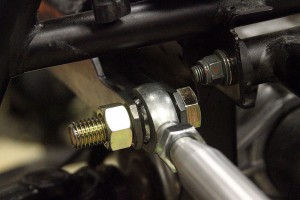 Check out the heavy duty steering rack bracket and Blue Torch Fab tie rod, which is using temporary bolts and nuts.