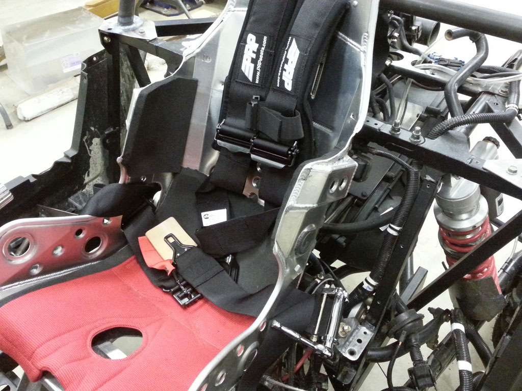 Here's a look at the modified Kirkey seat and PRP ratchet harness system.