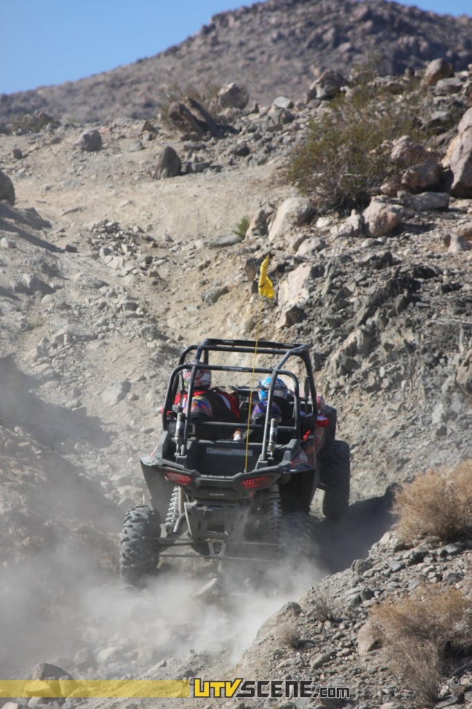 UTV Scene car making quick work of the hills in Johnson Valley