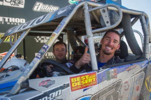 Branden Sims (right) gives a thumbs up on the podium after he and co-pilot Justin Krause won the UTV Pro class at the BITD UTV World Championship in Laughlin, Nev. (image courtesy of event promoter)