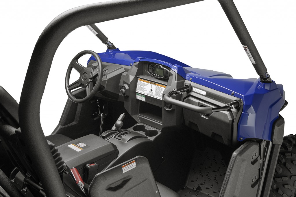 Here you can see the adjustable passenger grab bar and shoulder support, supplied for both driver and passenger. They help to keep you planted in the vehicle and away from the outside elements. Also, this image shows how the short hood area dives down to allow excellent visibility.