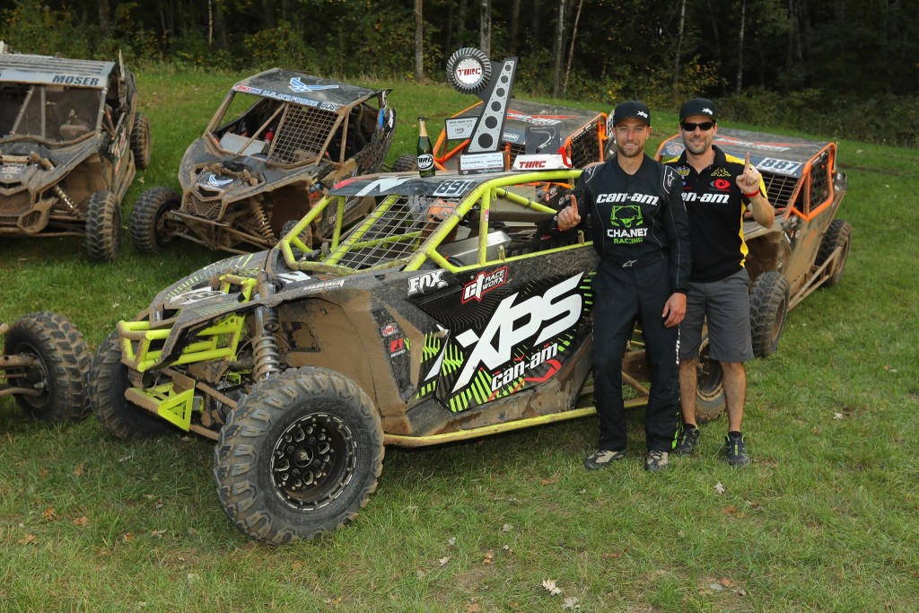 Kyle Chaney and Jeff Leclerc, Can-Am Race Department team leader, celebrated the first ever The Off-Road Championship (TORC) series championship for Can-Am after Chaney had three podiums (two wins) this weekend in Minnesota. (Photo by Harlen Foley) 